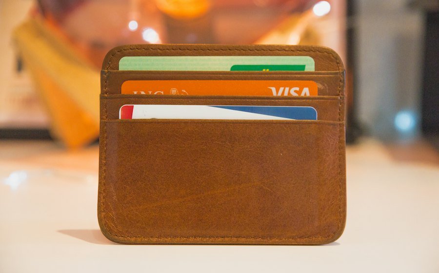A wallet holding several credit cards