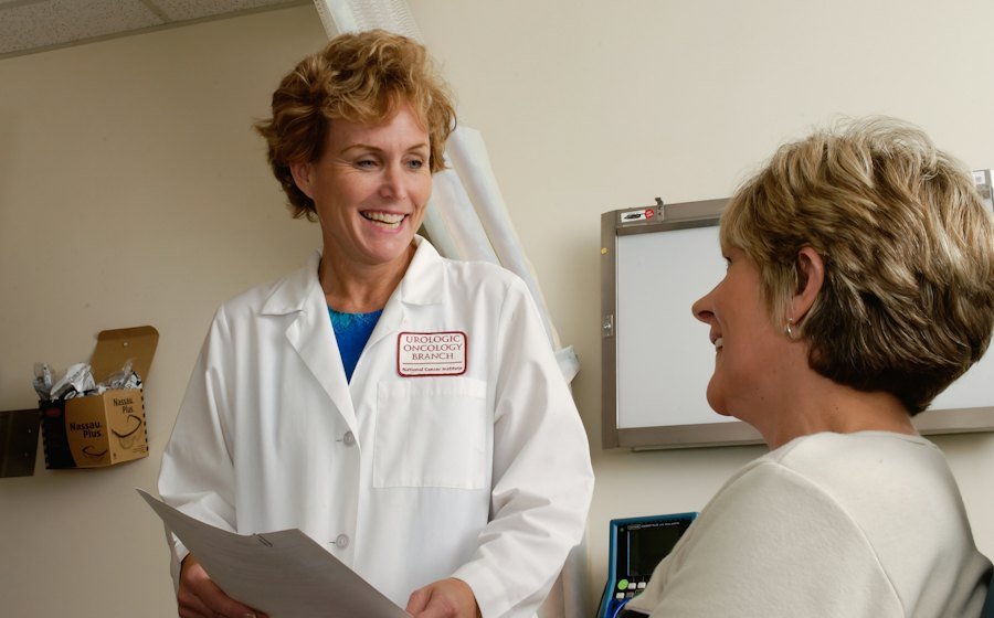 A doctor talking with a patient in a clinic